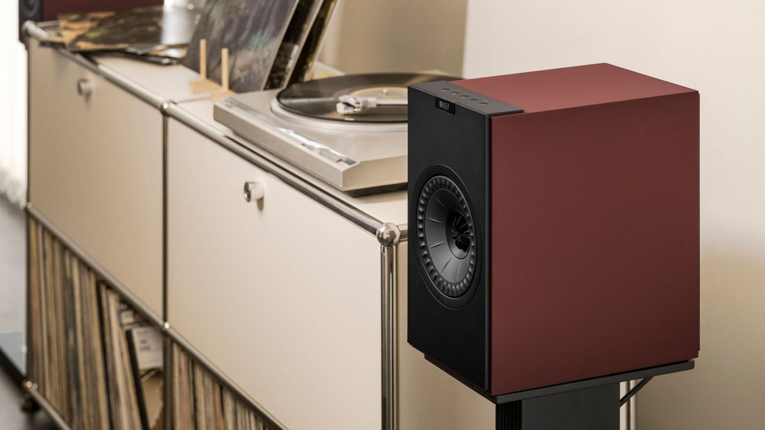 Close up of KEF Coda W wireless speaker mounted to a floor stand 